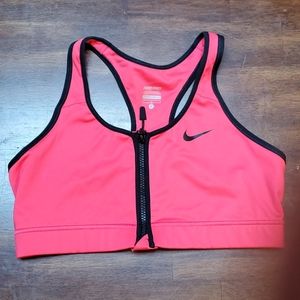 Hot pink and black Nike sports bra